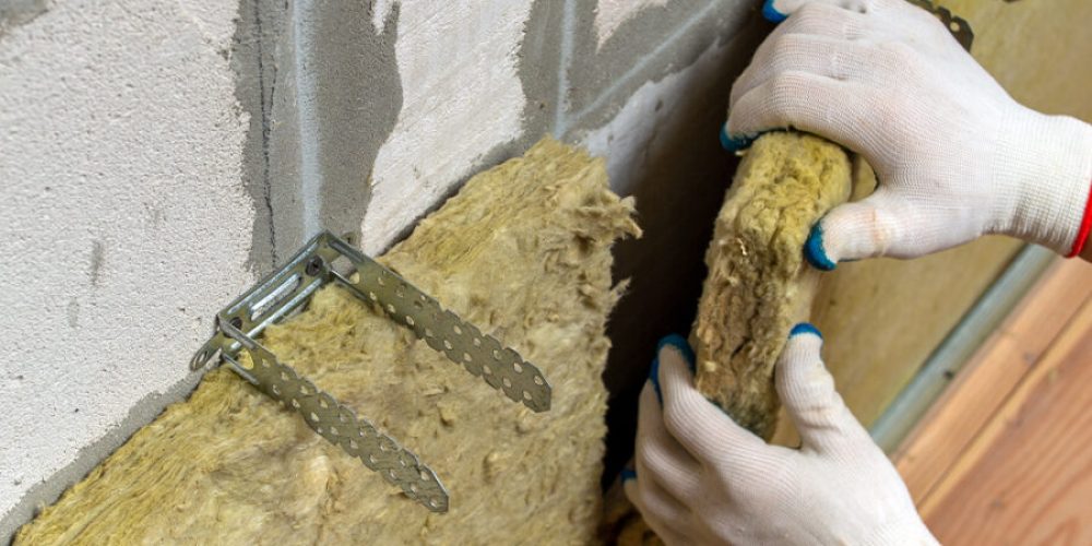 worker-insulating-a-room-wall-with-mineral-rock-wo-2025-06-29-06-44-56-utc